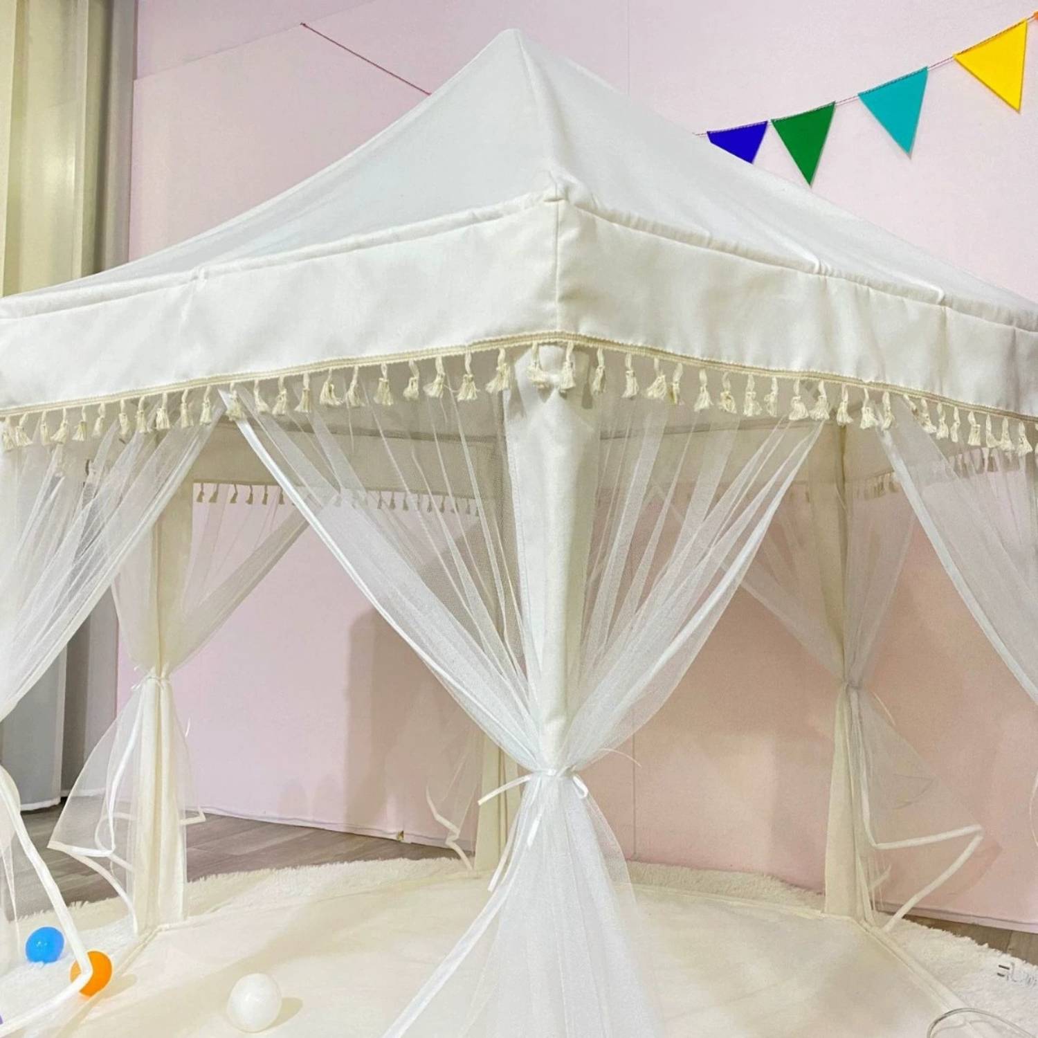 A pink princess castle play tent